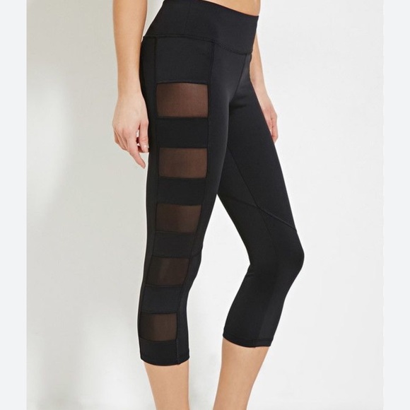 Forever 21 women’s long leggings black with mesh panels on sides - Picture 1 of 8